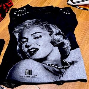 It’s a shirt with Marilyn Monroe on it